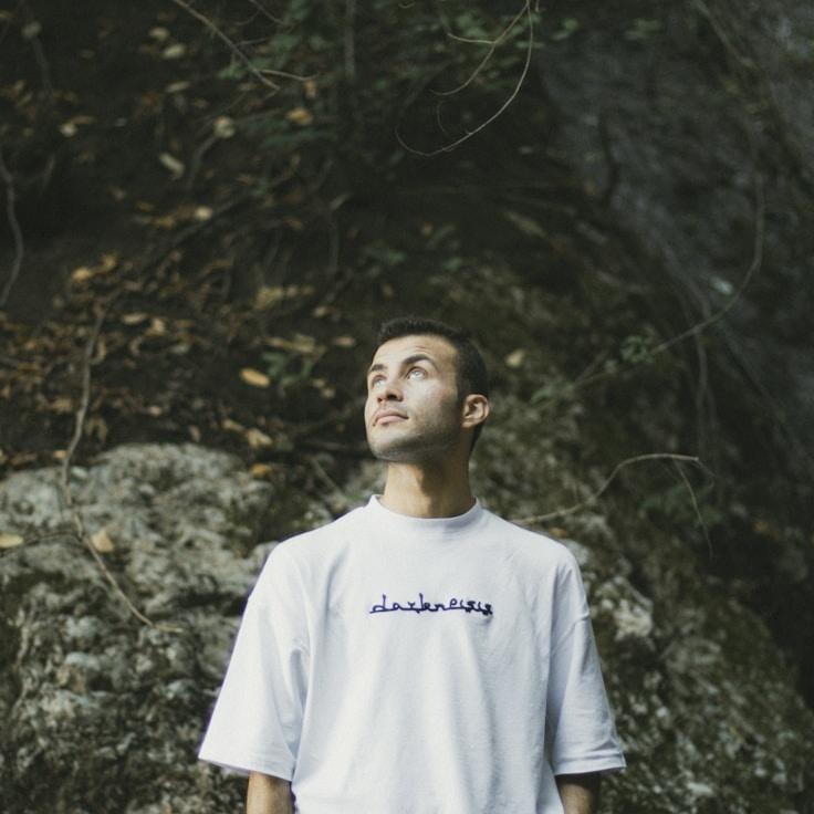 Avery Singh, Lead Design Curator at Digital Marketin Sight, reviewing corporate floral arrangements